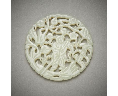 Chinese carved and pierced jade disc depicting a figure surrounded by foliage. Carved of a pale green-white jade.Diameter: 2 