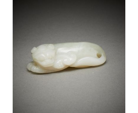 Chinese carved jade mythical beast holding a spray of lingzhi mushrooms in its mouth. Carved from a pale green-white jade.Hei