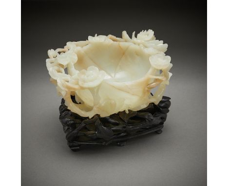 An excellent example of Chinese jade carving of the late Qing, this brush washer exhibits the fine craftsmanship and material