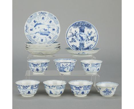 Group of 14 Chinese Bleu de Hue blue and white porcelain saucers and cups. Each decorated with floral and foliate motifs. Inc