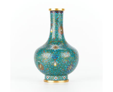 Lao Tian Li (Chinese, 19th/20th c). Chinese Republic cloisonne enamel vase with a blue ground decorated with green vines inte