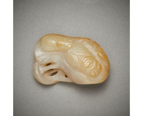 Chinese carved jade pebble toggle in the form of two cicadas on a leaf with a bat. Carved of a green-white jade with russet i