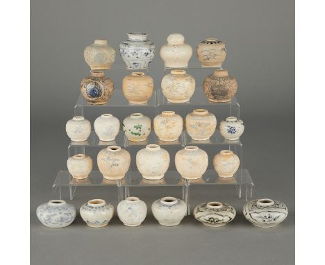 Group of 25 small blue and white ceramic Chinese shipwreck jars. With designs of flowers, geometric patterns, landscapes, and