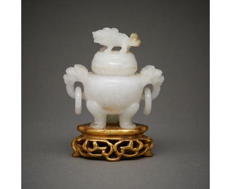 A very fine Chinese 19th century white jade tripod censer carved from white and green jade. The green of the jade is well int