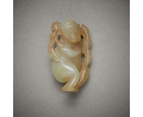 Small Chinese jade carving depicting a monkey holding foliage. Carved of a bluish-green stone.Height: 1/2 in x width: 3/4 in 