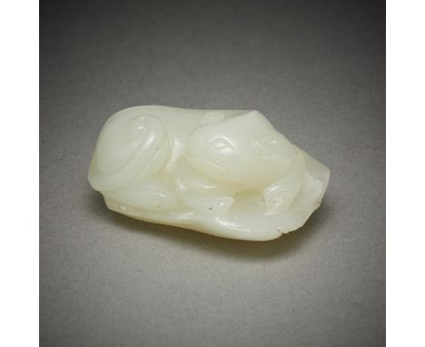 Chinese jade carving depicting an animal, possibly a cat, curled up on a leaf. Carved of a pale green-white jade.Height: 1 in