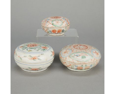 Group of three Chinese Ming dynasty ceramic lidded boxes. Swatow ware, decorated in red, blue, and green with floral motifs.H