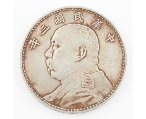 1914 year 3 Chinese one yuan silver dollar. The obverse with a profile portrait of Yuan Shikai (Shih-Kai) with the year writt