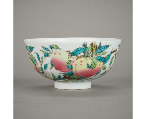 Chinese famille rose porcelain bowl painted with enamel peaches and bats. The carefully potted bowl painted with two bats and