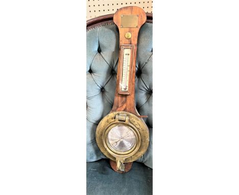 Ship's Aneroid Barometer, early 20th century. Made by Ltd. Cdr Roy Williams. The brass mounted dial in the form of a porthole