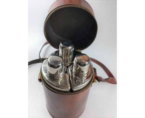 A Chromium plated Hip flask in leather case 
