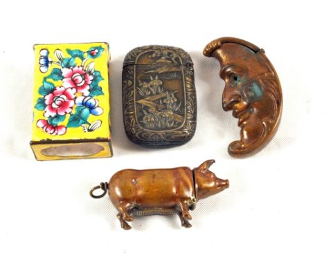 Pig and moon vestas, one other and an enamel match holder