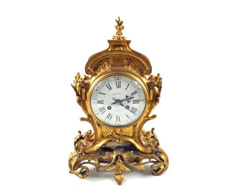 An Ormolu Maple French striking mantel clock, marked Maple & Cie, Paris, height 15"