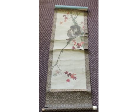 A Chinese scroll of Monkey in a tree with character marks