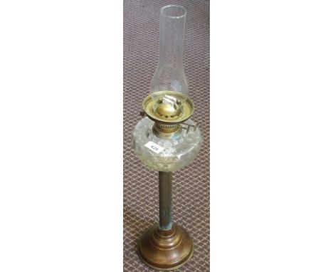 A Brass column oil lamp