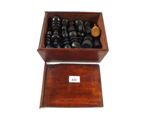 A Mahogany cased wooden chess set