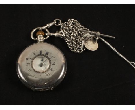 A Silver cased half hunter pocket watch on Silver chain with "John Caley from Mrs Freeman in Grateful Appreciation of Valuabl