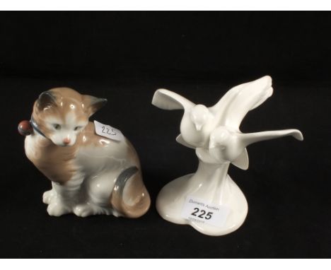 A Nao cat with bell on its collar, a Royal Doulton lady figurine, Lesley HN2410 (as found) and a Royal Doulton, Images of Nat