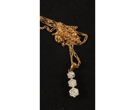 A 9ct Gold triple Diamond pendant and chain (missing one Diamond)