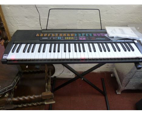 Casio CTK-520L electronic keyboard with stand
