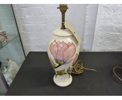 Moorcroft floral decorated table lamp with ivory background, height 32cm 