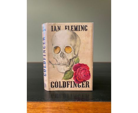 FLEMING, Ian. Goldfinger, FIRST EDITION, 8vo, publisher's imitation black cloth lettered in gilt, embossed skull with gilt co