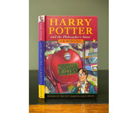 ROWLING, J. K. Harry Potter and the Philosopher's Stone, first edition, 10th printing, 8vo, hardback, bold &amp; vibrant boar