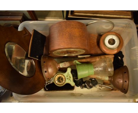 A mixed collection of items to include an oak cased mantle clock, a mirror, a smaller clocker, a circular barometer etc. No c