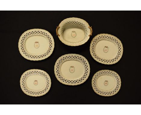 Chinese export pierced porcelain painted with a family crest to consist of a desert basket with stand and 4 matching plates (