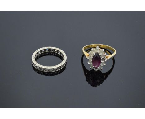 A 9ct dress ring (stamped 375) together with a 9ct eternity ring (stamped 9ct): both with semi-precious stones (4.6 grams gro