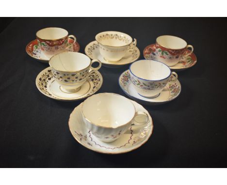 A collection of 19th century tea cups and saucers made by various English potter mainly in the style of Worcester, Newhall, S