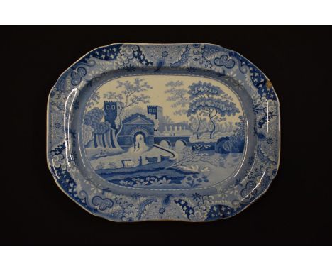 Early 19th century blue and white Clews charger with a castle pattern. There is a chip on the item as well as grazing to the 