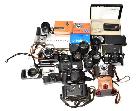 A quantity of vintage cameras, lenses and accessories, a Rolei A26 C26 flash, Zenit B camera, Agfa Silette Rapid I in origina