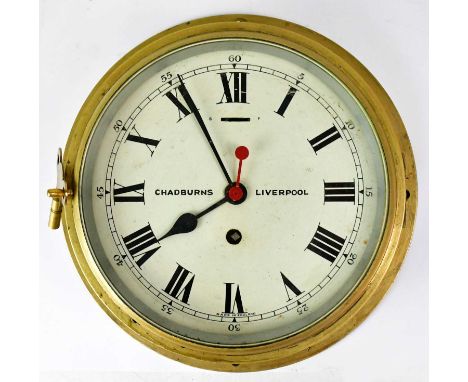 CHADBURNS, LIVERPOOL; a wall mounted brass cased thirty-hour porthole clock, the white painted dial set with Roman numerals, 