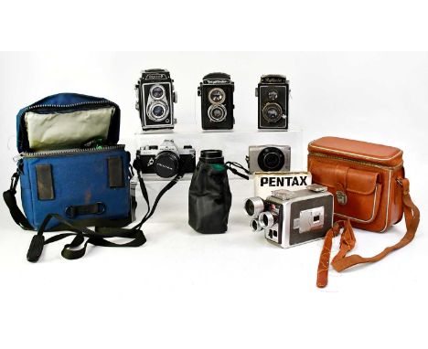 A collection of cameras to include a Voigtlander Brilliant, a Rollop with an Ennagon 75mm f3.5 lens, a Reflecta Pronotor II, 