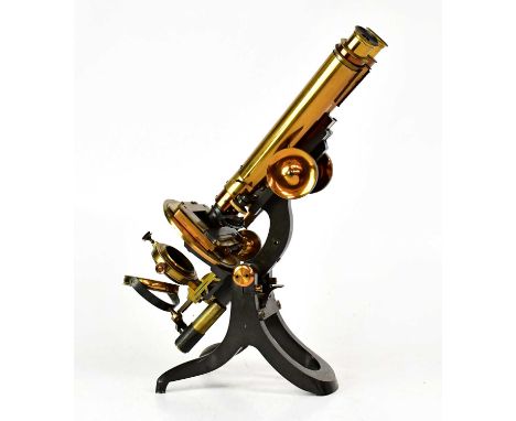 A. J. SWIFT &amp; SON; a lacquered brass compound binocular microscope stamped 'Swift &amp; Son 45 University Street London W