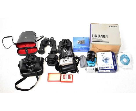 A quantity of cameras, camcorders and binoculars including a boxed Canon UC-X40 Hie camcorder, a Sony DSC-W 35 Cybershot came