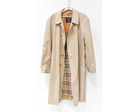 BURBERRYS; a gentlemen's tan overcoat, with zip-in wool liner.Condition Report: With collar turned up, length from top of col