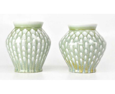 ROYAL LANCASTRIAN; a pair of green and white drip glaze squat baluster vases, impressed marks to base, height 15.25cm (2).