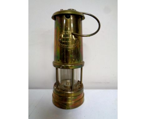 A Lamp and Limelight brass miner's lamp  