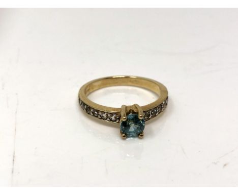 A 9ct gold topaz ring, size N.  CONDITION REPORT: 2.8g