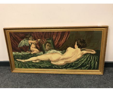 A gilt framed tapestry depicting a reclining nude, 107 x 49 cm 