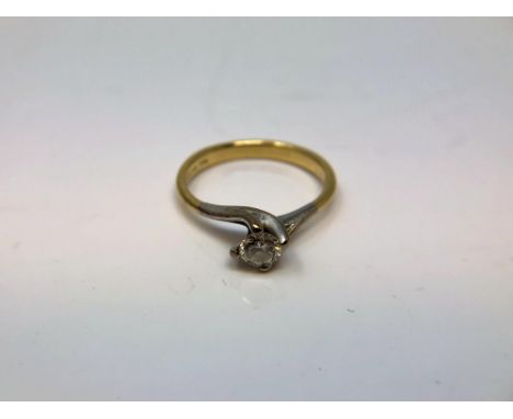 An 18ct yellow gold diamond solitaire ring, the brilliant cut stone approximately 0.3ct, size N.