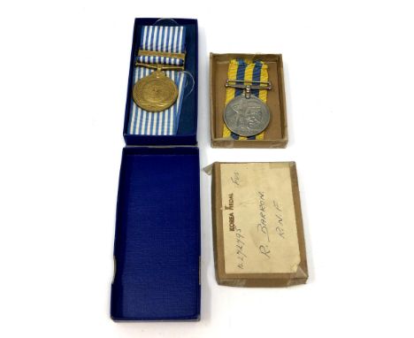 A Korean War medal pair issued to R Barron, Royal Northumberland Fusiliers. 