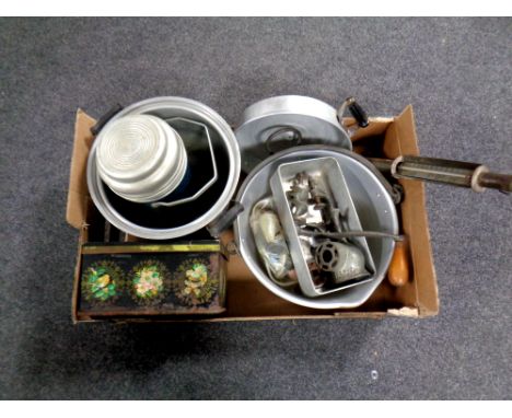 A box containing antique and later kitchenalia to include thermometer, meat grinder, aluminium jam pan, cooking pot, thermos 