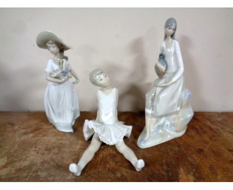 A Nao figure, seated ballerina, together with two further Nao figures  