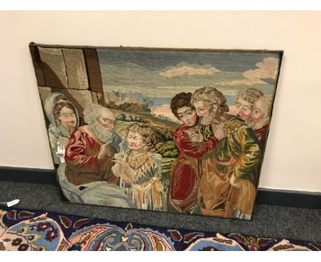 A nineteenth century tapestry depicting figures with a child, 81 cm x 56 cm.