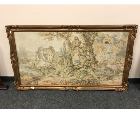 A gilt framed tapestry depicting cherub waterfall in gardens, 129 cm x 68 cm.