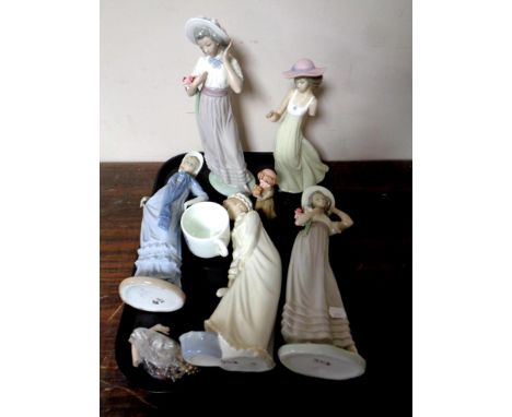 A tray containing five Nao figures, ladies (as found), a small quantity of costume jewellery, a Coalport commemorative mug, t