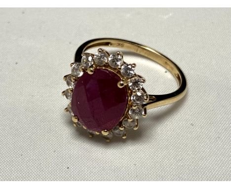 A 9ct gold ruby and cubic zirconia cluster ring   